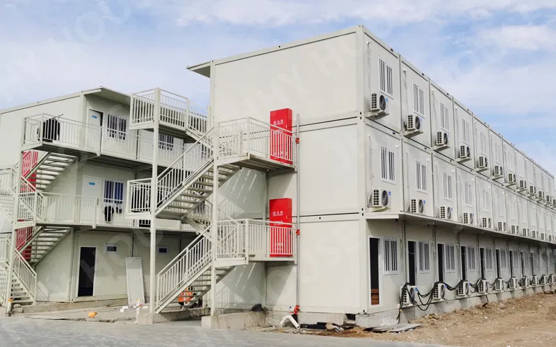 Multi-unit container housing for a construction camp
